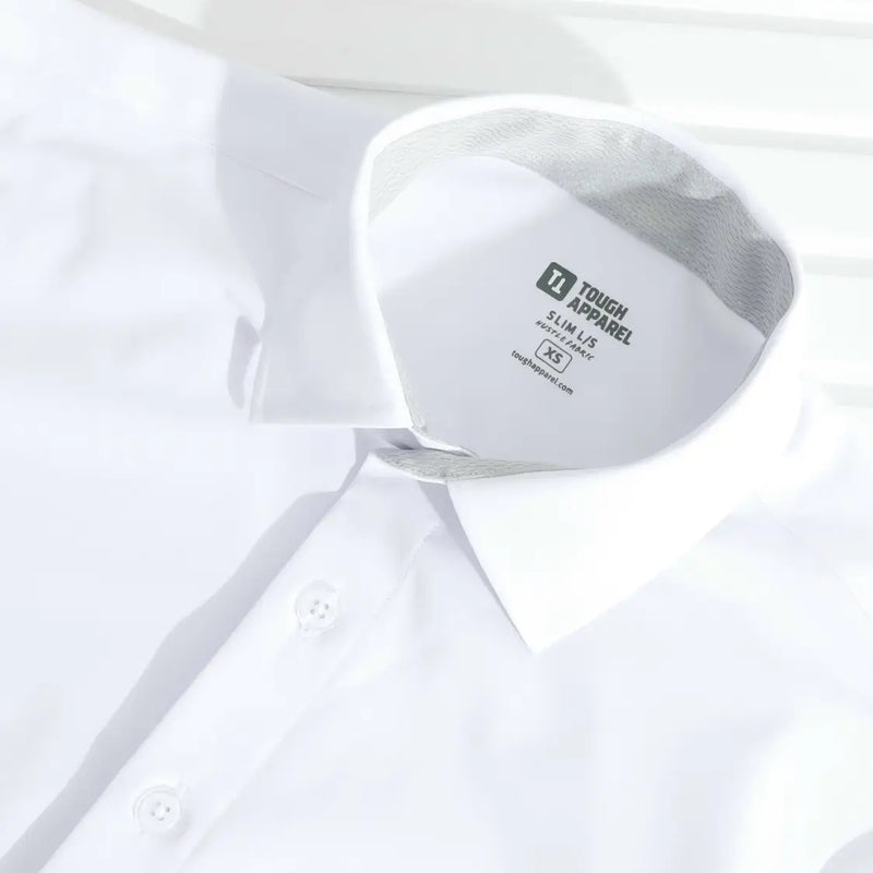 White cap with 'Tough Apparel' logo on a white shirt background